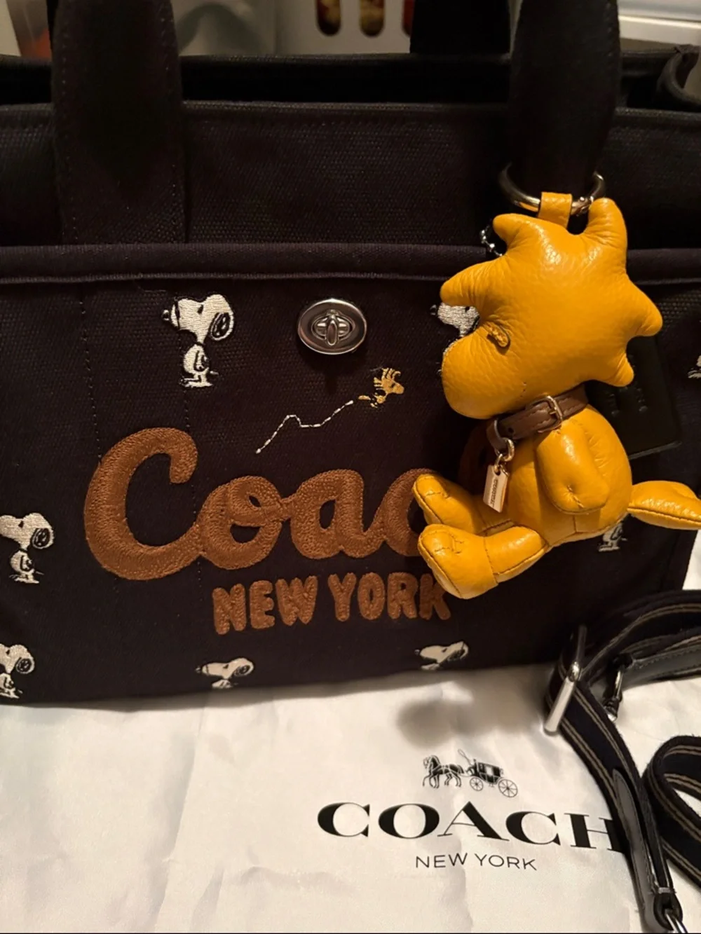 Coach X Peanuts Snoopy Black Canvas Tote with Yellow Woodstock Charm - Picture 3 of 9